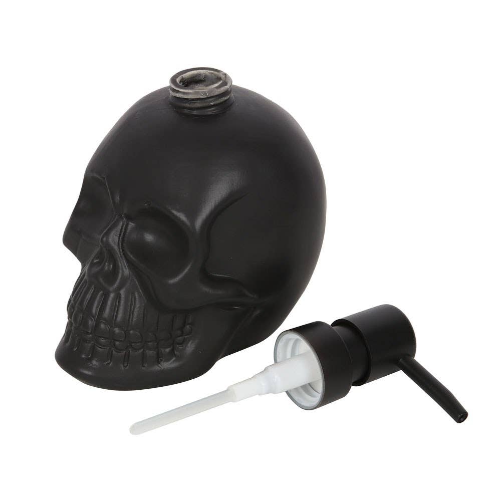 Dispensador de jabón con forma de calavera negra